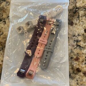 Fitbit Women's Purple, Pink, and Gray Watch Straps